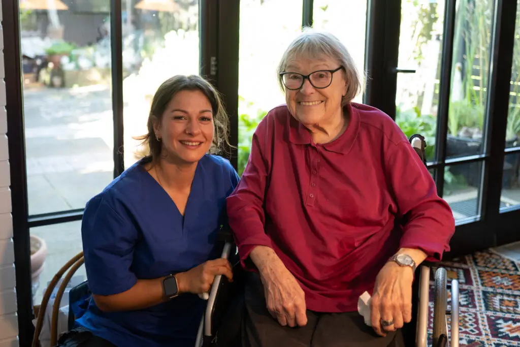 Pflegerin mit Patientin